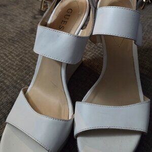 Like new Size 8 Guess white wedge heel sandals.